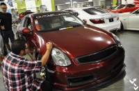 Didn't know why he was writing on the car. Also, the car was keyed all over. 